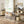 Buffet meuble de rangement avec portes coulissantes à lattes, armoire de cuisine avec pieds en acier, ton chêne