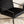 Fauteuil Rakel en velours noir et piètement acier en situation