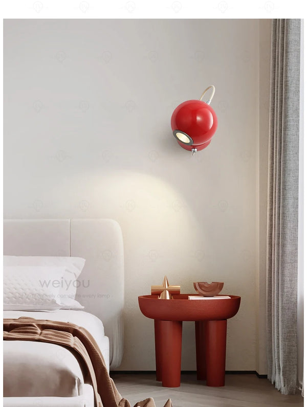 Applique murale LuminaBoule rouge pivotant