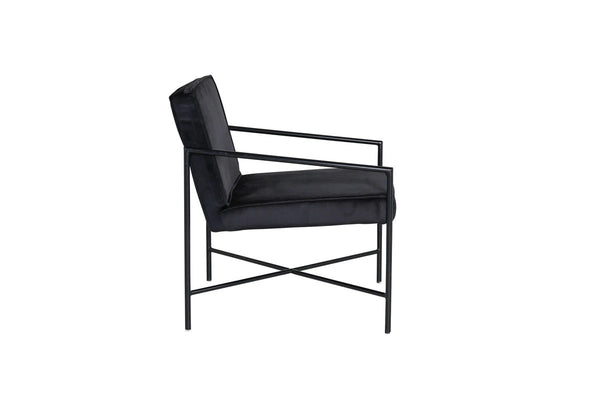 Fauteuil Rakel — velours noir et acier, le coin lecture immédiat