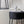 Pouf Petra noir dans un salon scandinave
