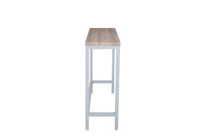 Table d'appoint Rise bois clair et gris utilisée comme console d'entrée