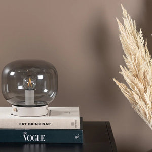 Lampe à poser Bollonelie en acier et verre fumé