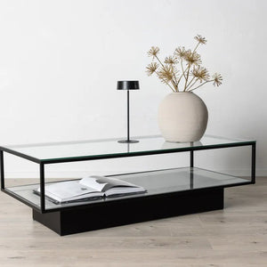 Table basse Maglehem 130 x 60 cm en verre et acier noir mat
