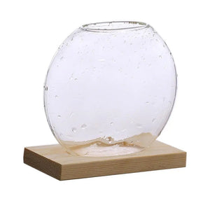 Vase en verre Minimaliste sur socle rond et bois clair